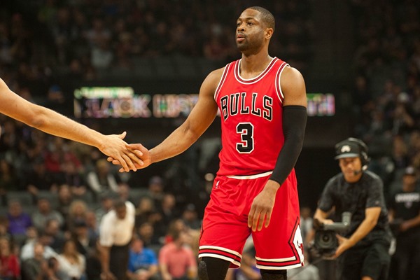 Dwyane Wade Joins Jimmy Butler on the Bench for the Bulls Against the Warriors