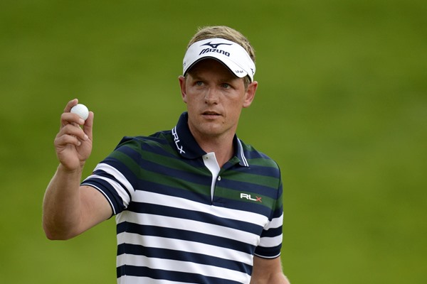 Luke Donald leads after an incomplete opening round at Merion. 
